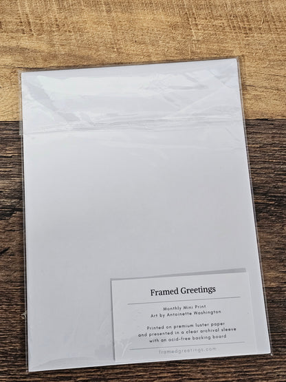 White greeting card with text on a wooden surface