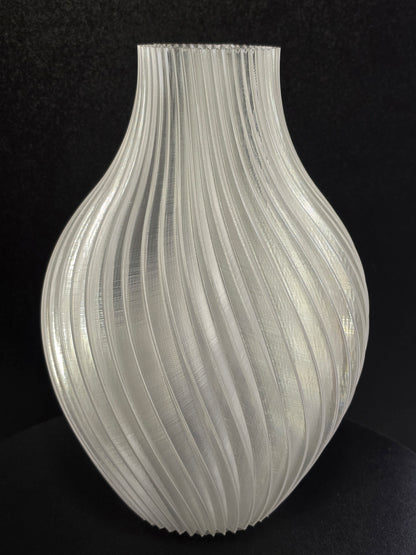 Clear Vase with Swirl Pattern on black background