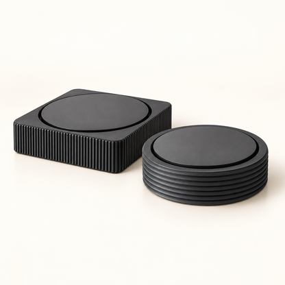 A set of matte rotating art displays with vertical ridges, displayed on a clean off-white background.
